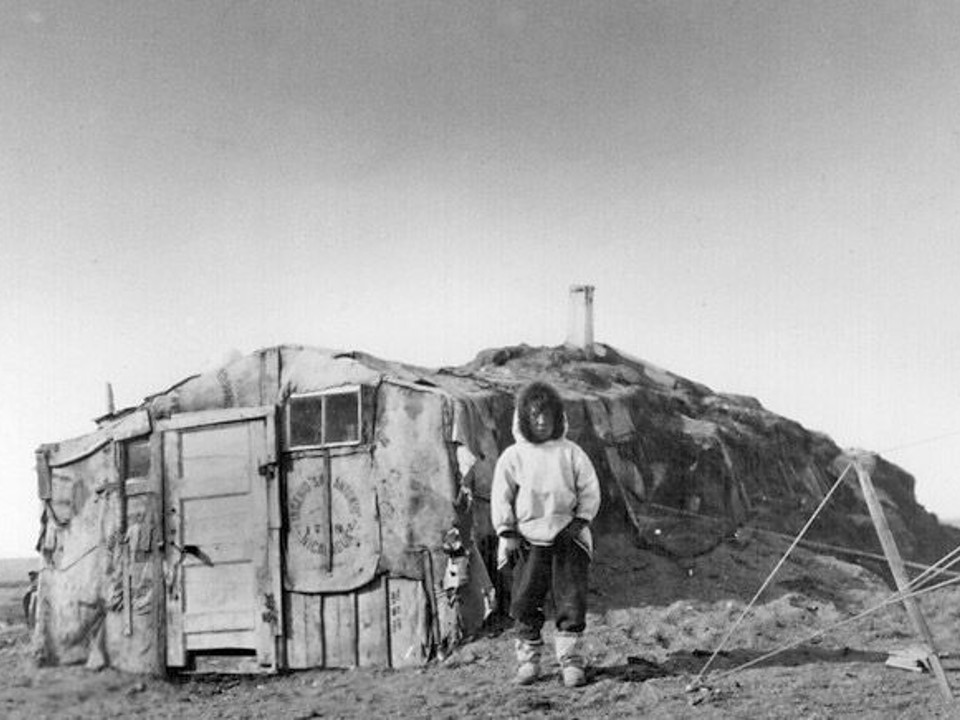 Historic photograph of an Inuvialuit Sod House.