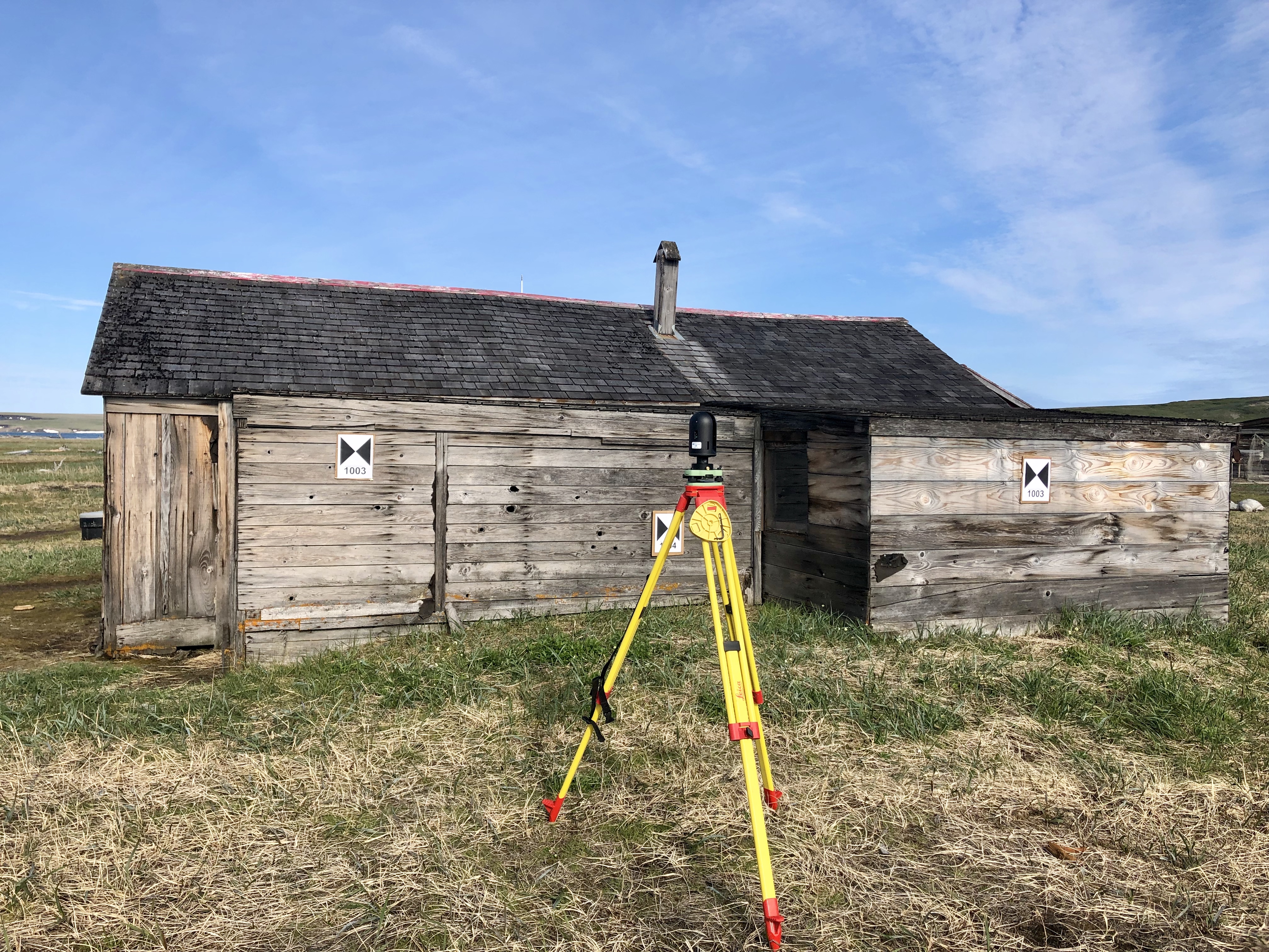 Image of digitally capturing Small House, no. 12 with the Leica BLK 360 terrestrial laser scanner. August 2019. Photo source: Capture2Presev project
